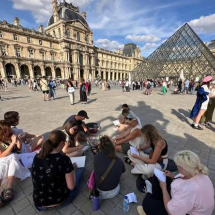 Design students sketch at the Louvre